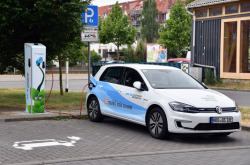 Electric car at a charging station